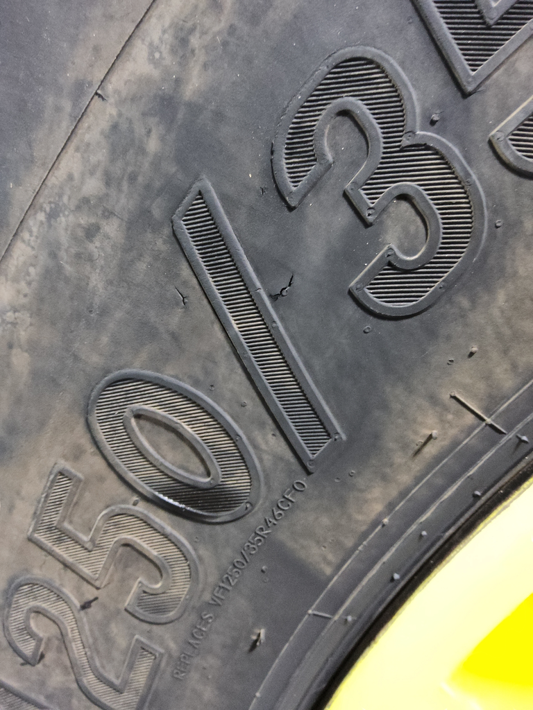 LSW 1250/35R46 Goodyear Farm Custom Flo Grip R-2 on John Deere Yellow 20-Hole Formed Plate 85%