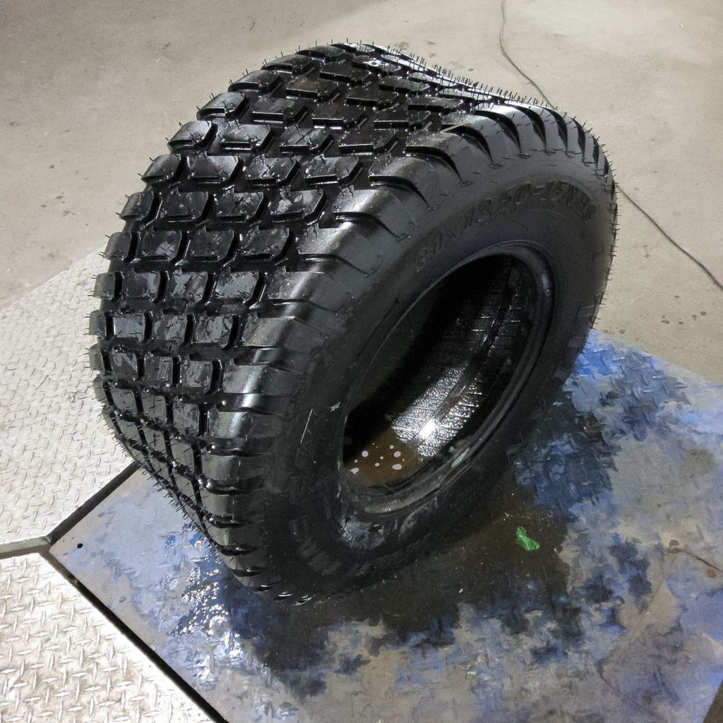 31x13.50-15NHS Titan Farm Multi Trac C/S HF-1 F (12 Ply)