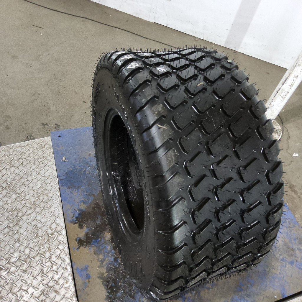 31x13.50-15NHS Titan Farm Multi Trac C/S HF-1 F (12 Ply), 99%