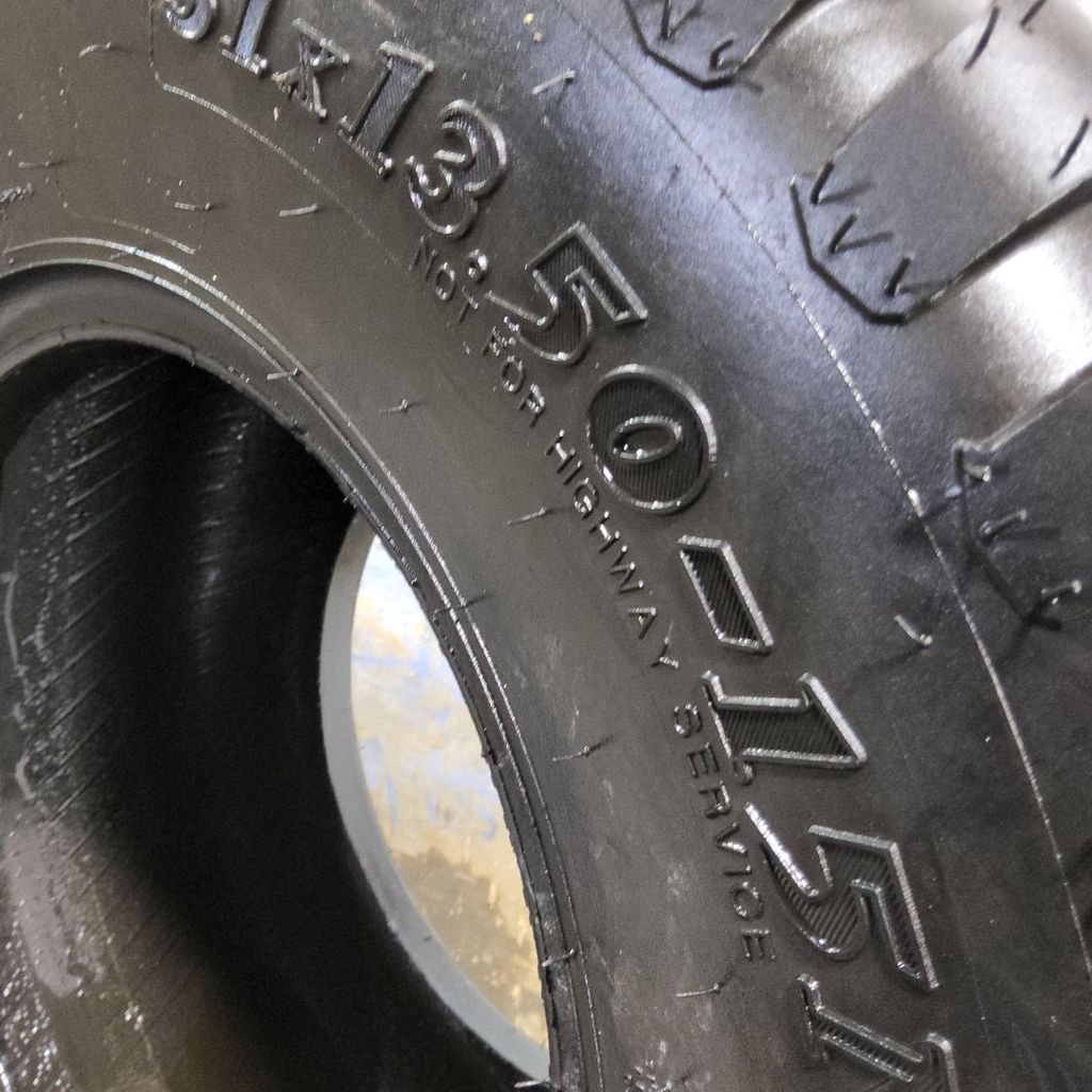 31x13.50-15NHS Titan Farm Multi Trac C/S HF-1 F (12 Ply), 99%