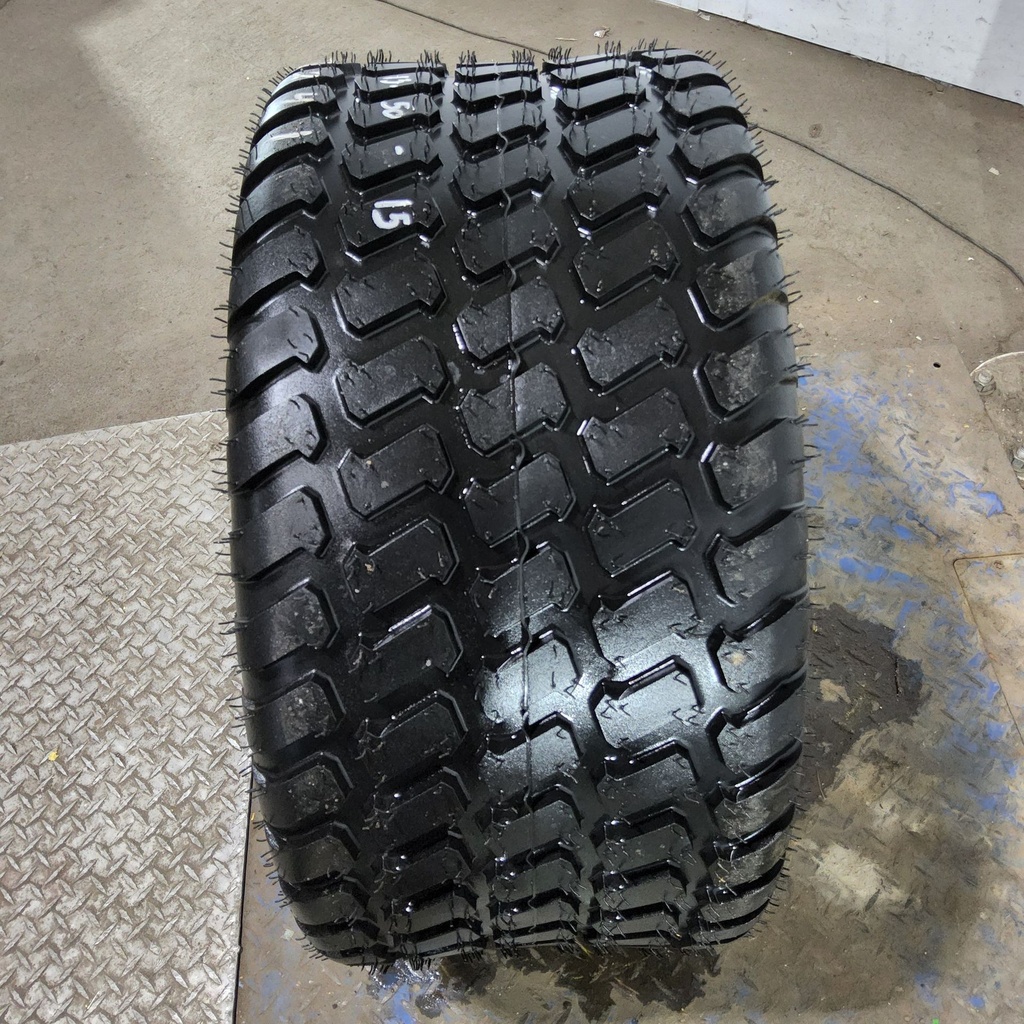 31x13.50-15NHS Titan Farm Multi Trac C/S HF-1 F (12 Ply), 99%