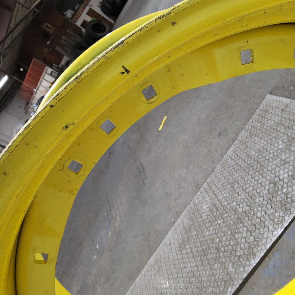 15"W x 34"D, John Deere Yellow 12-Hole Waffle Wheel (Groups of 3 bolts)