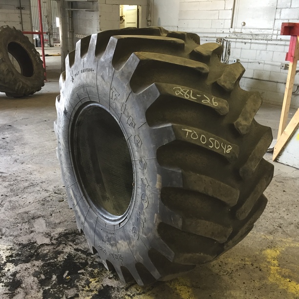 28/L-26 Firestone Super All Traction 23 R-1, F (12 Ply) 75%